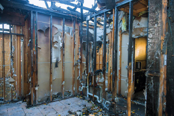 Professional Fire Damage Restoration technician working in Helena, OK